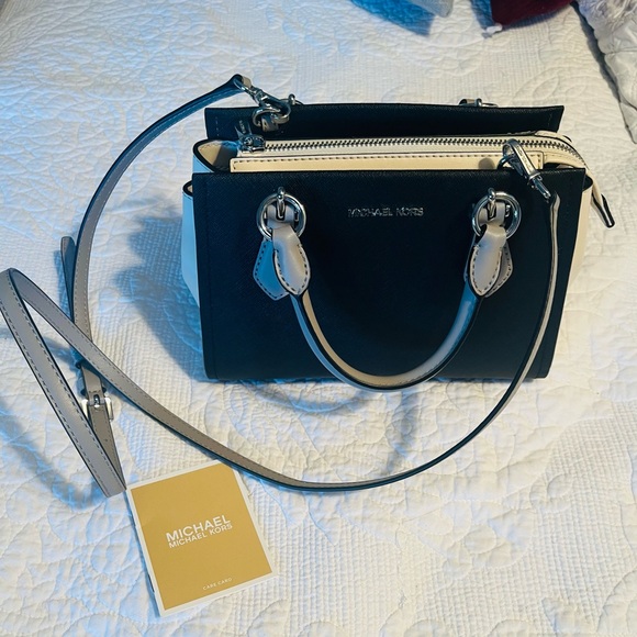 Michael Kors Handbags - Michael Kors Black and Cream Small Marilyn Black Saffiano Messenger Women's Bag